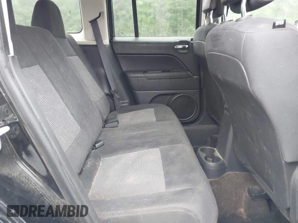 2014 Jeep Patriot Latitude z VIN 1C4NJPFAXED577162, wystawiony jako IAAI lot #42355950 z przebiegiem 123 460 mil mil oraz . Historia ofert i sprzedaży dostępna na DreamBid. Obrazek 8.