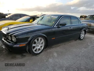 2004 Jaguar XJ with VIN SAJWA71C04SG31354, listed as a Copart auction lot 73742404 with 0 mi miles and Non Repairable. Bid and sale history available at carsss.com. Image 1.