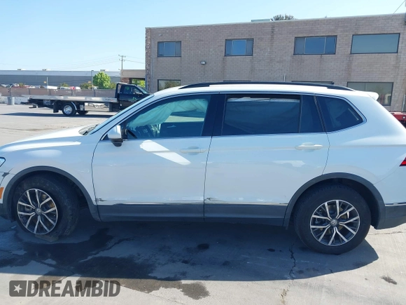 2020 Volkswagen Tiguan SE z VIN 3VV3B7AX8LM120160, wystawiony jako IAAI lot #42316791 z przebiegiem 38 702 mil mil oraz . Historia ofert i sprzedaży dostępna na DreamBid. Obrazek 14.