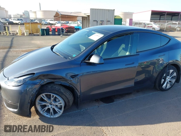 2023 Tesla Model Y Long Range with VIN 7SAYGDEE0PF928836, listed as a IAAI auction lot 41538742 with 9,630 mi miles and . Bid and sale history available at DreamBid. Image 6.