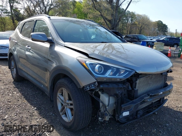 2018 Hyundai Santa Fe 2.4L z VIN 5NMZUDLB7JH077241, wystawiony jako IAAI lot #42135854 z przebiegiem 59 819 mil mil oraz . Historia ofert i sprzedaży dostępna na DreamBid. Obrazek 1.