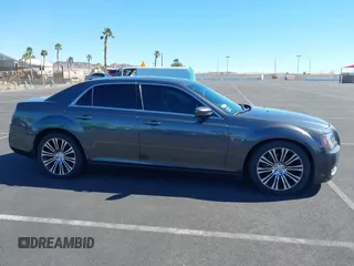 2013 Chrysler 300 with VIN 2C3CCABT4DH644186, listed as a IAAI auction lot 41693442 with 102,802 mi miles. Bid and sale history available at carsss.com. Image 13.