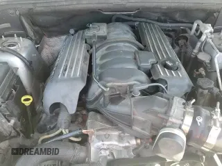 2012 Jeep Grand Cherokee SRT-8 z VIN 1C4RJFDJ2CC105829, wystawiony jako Copart lot #51840385 z przebiegiem 142 146 mil mil oraz Czysty tytuł • Clean title. Historia ofert i sprzedaży dostępna na DreamBid. Obrazek 14.