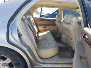2004 Cadillac DeVille with VIN 1G6KD54Y44U121318, listed as a IAAI auction lot 41833122 with 152,258 mi miles. Bid and sale history available at carsss.com. Image 8.