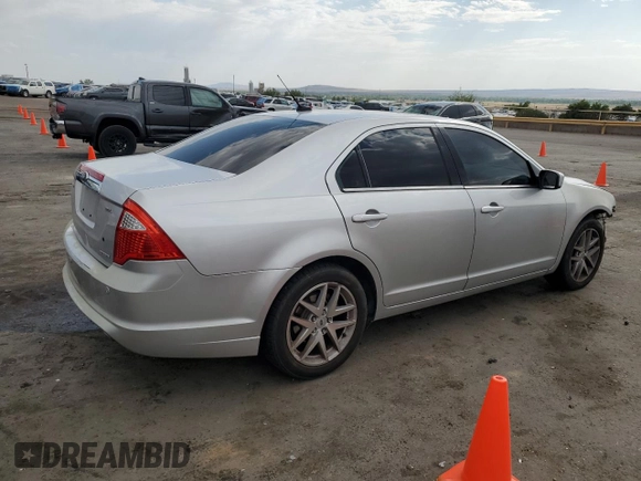 2012 Ford Fusion SEL with VIN 3FAHP0JG7CR257418, listed as a Copart auction lot 61842175 with 167,669 mi miles and Salvage title. Bid and sale history available at DreamBid. Image 3.
