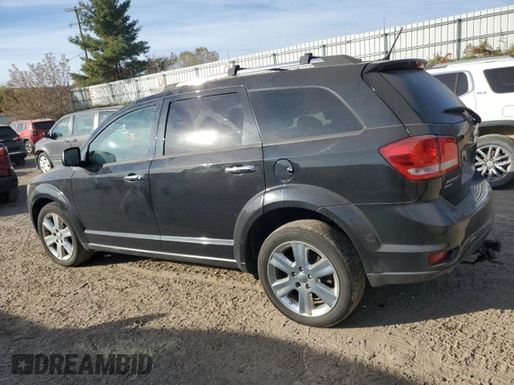 2013 Dodge Journey R/T with VIN 3C4PDDFG6DT736495, listed as a Copart auction lot 76912344 with 186,004 mi miles and Clean title. Bid and sale history available at DreamBid. Image 2.