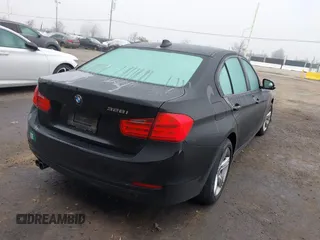 2014 BMW 3 Series 328i with VIN WBA3C1C55EK113128, listed as a IAAI auction lot 41259472 with 82,798 mi miles. Bid and sale history available at carsss.com. Image 4.