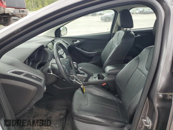 2014 Ford Focus Titanium with VIN 1FADP3N20EL329415, listed as a Copart auction lot 60881115 with 97,382 mi miles and Salvage title. Bid and sale history available at DreamBid. Image 7.