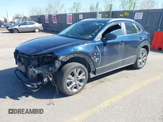 2024 Mazda CX-30 2.5 S Carbon Edition with VIN 3MVDMBCMXRM604020, listed as a IAAI auction lot 42042155 with 24,545 mi miles. Bid and sale history available at carsss.com. Image 2.