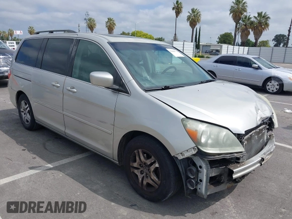 2005 Honda Odyssey EX-L with VIN 5FNRL38745B075486, listed as a IAAI auction lot 42080772 with 197,158 mi miles and . Bid and sale history available at DreamBid. Image 1.