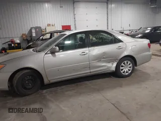 2006 Toyota Camry STD with VIN 4T1BE32K86U146203, listed as a IAAI auction lot 41848666 with 209,159 mi miles. Bid and sale history available at carsss.com. Image 6.