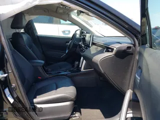 2022 Toyota Corolla Cross XLE with VIN 7MUEAABG3NV042742, listed as a IAAI auction lot 42595052 with 54,299 mi miles and . Bid and sale history available at DreamBid. Image 5.