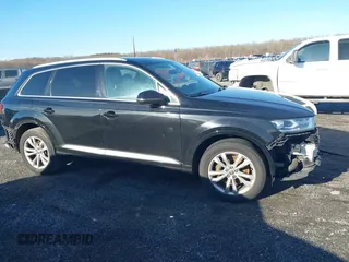 2018 Audi Q7 Premium z VIN WA1AHAF79JD018461, wystawiony jako IAAI lot #41880373 z przebiegiem 107 346 mil mil oraz . Historia ofert i sprzedaży dostępna na DreamBid. Obrazek 13.