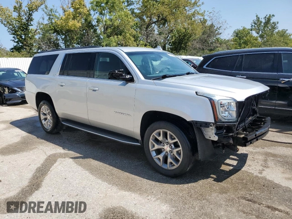 2015 GMC Yukon XL SLE with VIN 1GKS2GKC4FR678777, listed as a Copart auction lot 68642194 with 151,909 mi miles and Salvage Title. Bid and sale history available at carsss.com. Image 4.