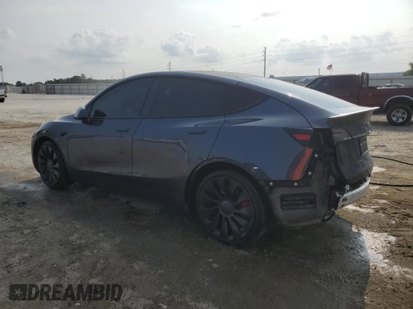 2022 Tesla Model Y Performance with VIN 7SAYGDEF4NF447462, listed as a Copart auction lot 58306595 with 61,671 mi miles and Non repairable. Bid and sale history available at DreamBid. Image 2.