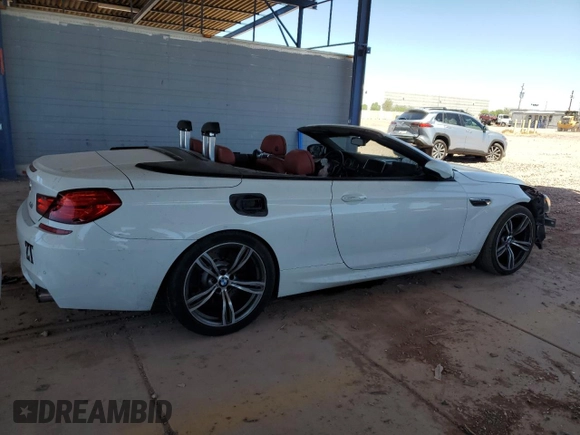2013 BMW M6 с VIN WBSLZ9C59DDZ77823, выставлен на аукционе Copart как лот 62354225 с пробегом 74 704 миль миль и Списание • Salvage title. История ставок и продаж доступна на DreamBid. Изображение 3.