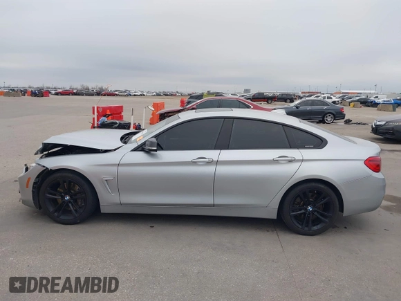 2018 BMW 4 Series 440i with VIN WBA4J5C57JBF07924, listed as a IAAI auction lot 41595682 with 75,121 mi miles and . Bid and sale history available at DreamBid. Image 14.