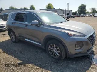 2019 Hyundai Santa Fe SE with VIN 5NMS23AD4KH033124, listed as a Copart auction lot 63225414 with 77,210 mi miles and Non Repairable. Bid and sale history available at carsss.com. Image 4.