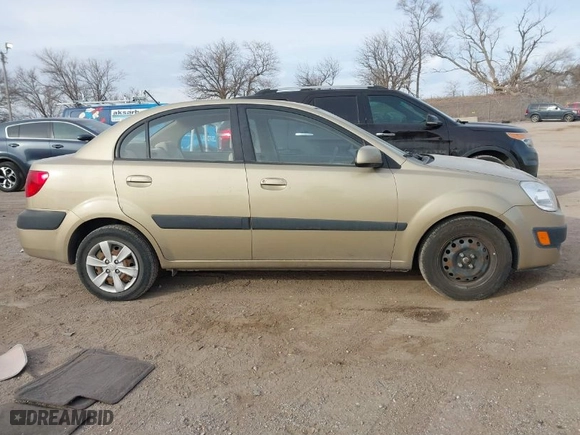 2009 Kia Rio with VIN KNADE223096461583, listed as a IAAI auction lot 41511296 with NaN miles. Bid and sale history available at carsss.com. Image 14.