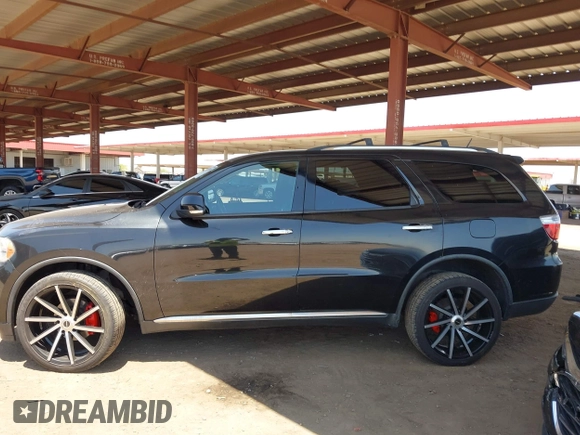 2013 Dodge Durango Crew with VIN 1C4RDHDG1DC508676, listed as a IAAI auction lot 42520380 with 126,250 mi miles and . Bid and sale history available at DreamBid. Image 14.