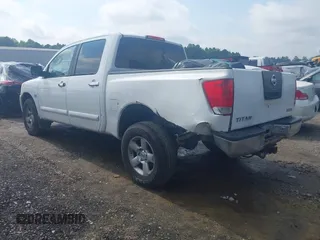 2004 Nissan Titan LE with VIN 1N6AA07B74N581334, listed as a IAAI auction lot 42265633 with 189,892 mi miles and . Bid and sale history available at DreamBid. Image 3.