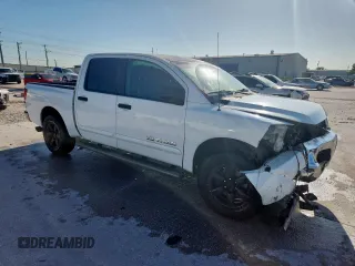 2012 Nissan Titan SV with VIN 1N6BA0ED2CN319597, listed as a Copart auction lot 62016445 with 169,120 mi miles and Salvage title. Bid and sale history available at DreamBid. Image 4.