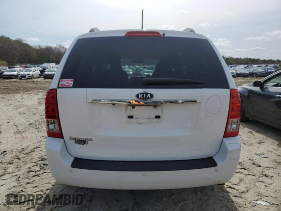 2012 Kia Sedona LX with VIN KNDMG4C72C6465538, listed as a Copart auction lot 51450135 with 84,972 mi miles and Salvage Title. Bid and sale history available at carsss.com. Image 6.