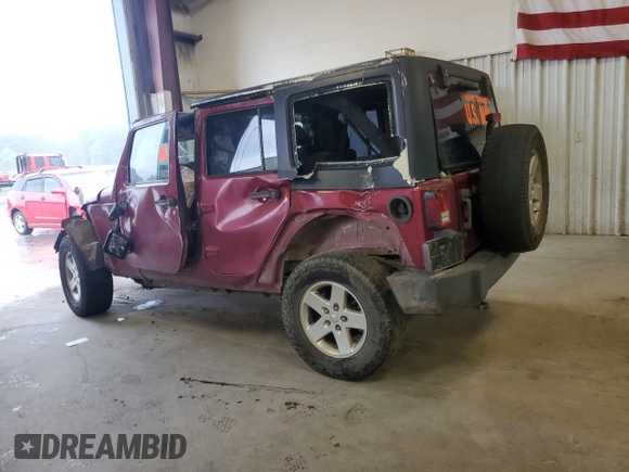 2013 Jeep Wrangler Unlimited Sport RHD with VIN 1C4BJWKGXDL517345, listed as a Copart auction lot 60552845 with 169,064 mi miles and Salvage title. Bid and sale history available at DreamBid. Image 2.