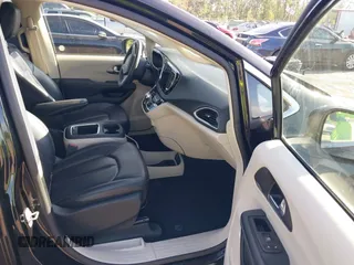 2023 Chrysler Pacifica Touring L with VIN 2C4RC1BG1PR606566, listed as a IAAI auction lot 42615498 with 42,980 mi miles and . Bid and sale history available at DreamBid. Image 5.