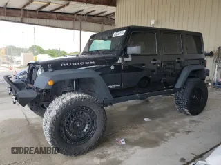 2017 Jeep Wrangler Unlimited Rubicon z VIN 1C4BJWFGXHL549857, wystawiony jako Copart lot #60826875 z przebiegiem 79 645 mil mil oraz Szkoda całkowita • Salvage title. Historia ofert i sprzedaży dostępna na DreamBid. Obrazek 1.