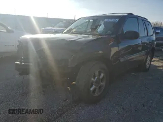 2003 GMC Envoy SLT with VIN 1GKDT13S532288817, listed as a Copart auction lot 85781094 with 0 mi miles and Salvage Title. Bid and sale history available at carsss.com. Image 1.