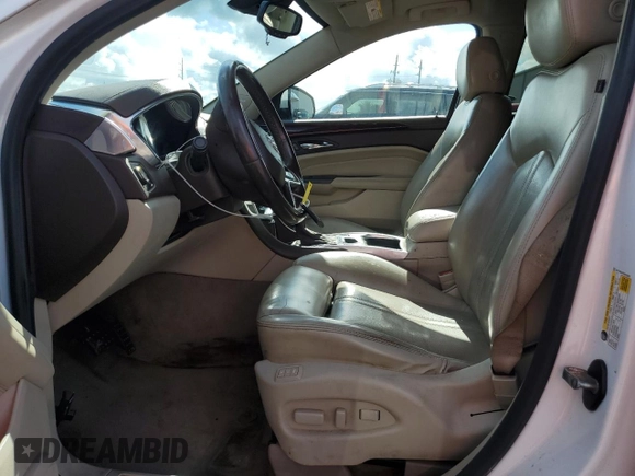 2014 Cadillac SRX Premium Collection z VIN 3GYFNGE31ES615593, wystawiony jako Copart lot #56785775 z przebiegiem 247 230 mil mil oraz Tytuł czysty. Historia ofert i sprzedaży dostępna na DreamBid. Obrazek 7.