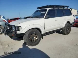 1995 Toyota Land Cruiser z VIN JT3DJ81W4S0100688, wystawiony jako Copart lot #48399085 z przebiegiem 120 994 mil mil oraz Czysty tytuł • Clean title. Historia ofert i sprzedaży dostępna na DreamBid. Obrazek 1.