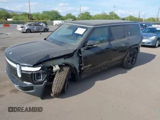 2023 Rivian R1S Adventure z VIN 7PDSGABA8PN020504, wystawiony jako IAAI lot #42025341 z przebiegiem 5989 mil mil oraz . Historia ofert i sprzedaży dostępna na DreamBid. Obrazek 20.