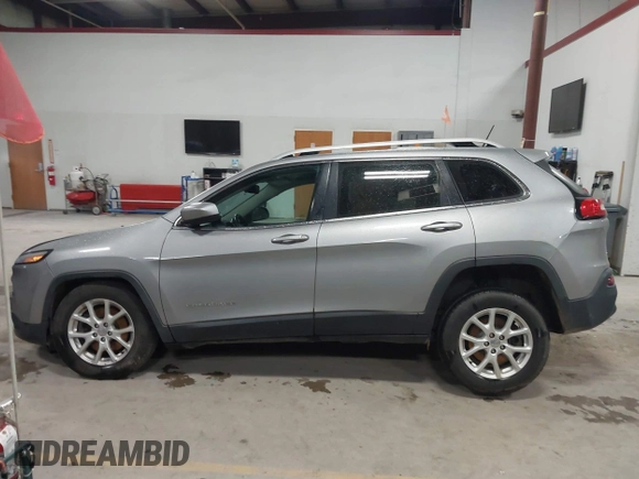 2016 Jeep Cherokee Altitude with VIN 1C4PJMCB6GW295404, listed as a IAAI auction lot 41211758 with 100,722 mi miles and . Bid and sale history available at DreamBid. Image 14.