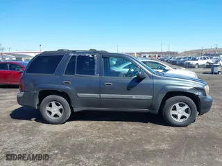 2004 Chevrolet TrailBlazer LS with VIN 1GNDT13S142391821, listed as a IAAI auction lot 41860650 with 184,915 mi miles. Bid and sale history available at carsss.com. Image 13.