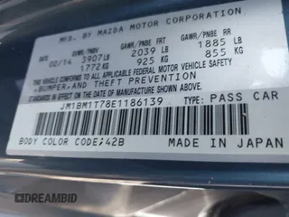 2014 Mazda 3 i SV with VIN JM1BM1T78E1186139, listed as a IAAI auction lot 41753058 with 117,197 mi miles and . Bid and sale history available at DreamBid. Image 9.