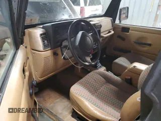 1997 Jeep Wrangler SE with VIN 1J4FY29PXVP476747, listed as a Copart auction lot 49218685 with 165,442 mi miles and Clean Title. Bid and sale history available at carsss.com. Image 8.