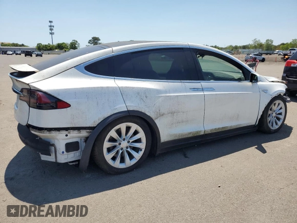 2016 Tesla Model X 70D z VIN 5YJXCAE26GF004233, wystawiony jako Copart lot #58378805 z przebiegiem 90 133 mil mil oraz Szkoda całkowita • Salvage title. Historia ofert i sprzedaży dostępna na DreamBid. Obrazek 3.