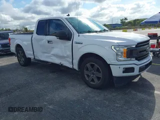 2020 Ford F-150 XL with VIN 1FTEX1CP4LKE56026, listed as a IAAI auction lot 41196057 with 92,828 mi miles and . Bid and sale history available at DreamBid. Image 1.