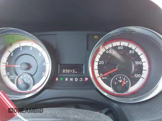 2014 Dodge Grand Caravan SXT with VIN 2C4RDGCG6ER477008, listed as a IAAI auction lot 41770610 with 89,843 mi miles and . Bid and sale history available at DreamBid. Image 7.