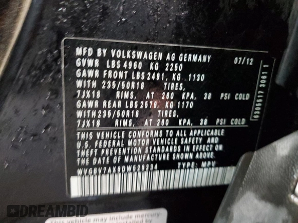 2013 Volkswagen Tiguan SE z VIN WVGBV7AX9DW529234, wystawiony jako Copart lot #41610635 z przebiegiem 130 566 mil mil oraz Szkoda całkowita • Salvage title. Historia ofert i sprzedaży dostępna na DreamBid. Obrazek 13.
