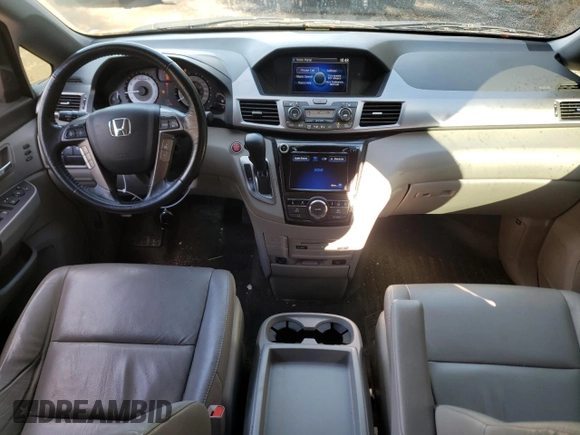 2014 Honda Odyssey Touring z VIN 5FNRL5H98EB512144, wystawiony jako Copart lot #69987533 z przebiegiem 184 231 mil mil oraz Szkoda całkowita • Salvage title. Historia ofert i sprzedaży dostępna na DreamBid. Obrazek 8.