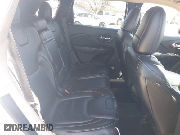 2015 Jeep Cherokee Latitude with VIN 1C4PJMCS8FW624375, listed as a IAAI auction lot 41848679 with 148,130 mi miles and . Bid and sale history available at DreamBid. Image 8.
