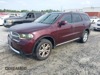 2012 Dodge Durango Crew z VIN 1C4RDHDG1CC144421, wystawiony jako IAAI lot #42232137 z przebiegiem 215 051 mil mil oraz . Historia ofert i sprzedaży dostępna na DreamBid. Obrazek 2.