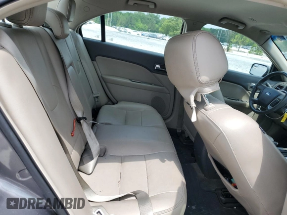 2012 Ford Fusion SEL z VIN 3FAHP0JA4CR371923, wystawiony jako Copart lot #55132125 z przebiegiem 135 390 mil mil oraz Szkody całkowita. Historia ofert i sprzedaży dostępna na DreamBid. Obrazek 10.