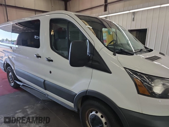 2016 Ford Transit Cargo z VIN 1FTYE1YM1GKB15643, wystawiony jako IAAI lot #42585640 z przebiegiem 301 257 mil mil oraz . Historia ofert i sprzedaży dostępna na DreamBid. Obrazek 35.