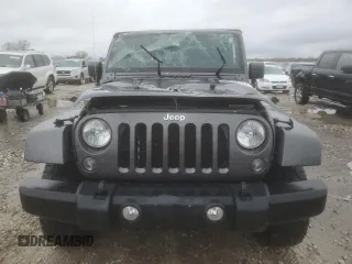 2014 Jeep Wrangler Rubicon with VIN 1C4BJWCG9EL189819, listed as a Copart auction lot 80522204 with 82,083 mi miles and Salvage title. Bid and sale history available at DreamBid. Image 5.