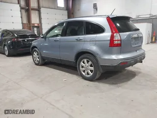 2007 Honda CR-V EX-L with VIN JHLRE48747C093649, listed as a IAAI auction lot 42086953 with 116,996 mi miles. Bid and sale history available at carsss.com. Image 3.