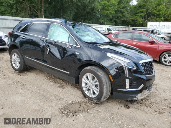 2023 Cadillac XT5 FWD Luxury z VIN 1GYKNAR40PZ106096, wystawiony jako Copart lot #80909074 z przebiegiem 19 677 mil mil oraz Nie do naprawy • Non repairable. Historia ofert i sprzedaży dostępna na DreamBid. Obrazek 4.